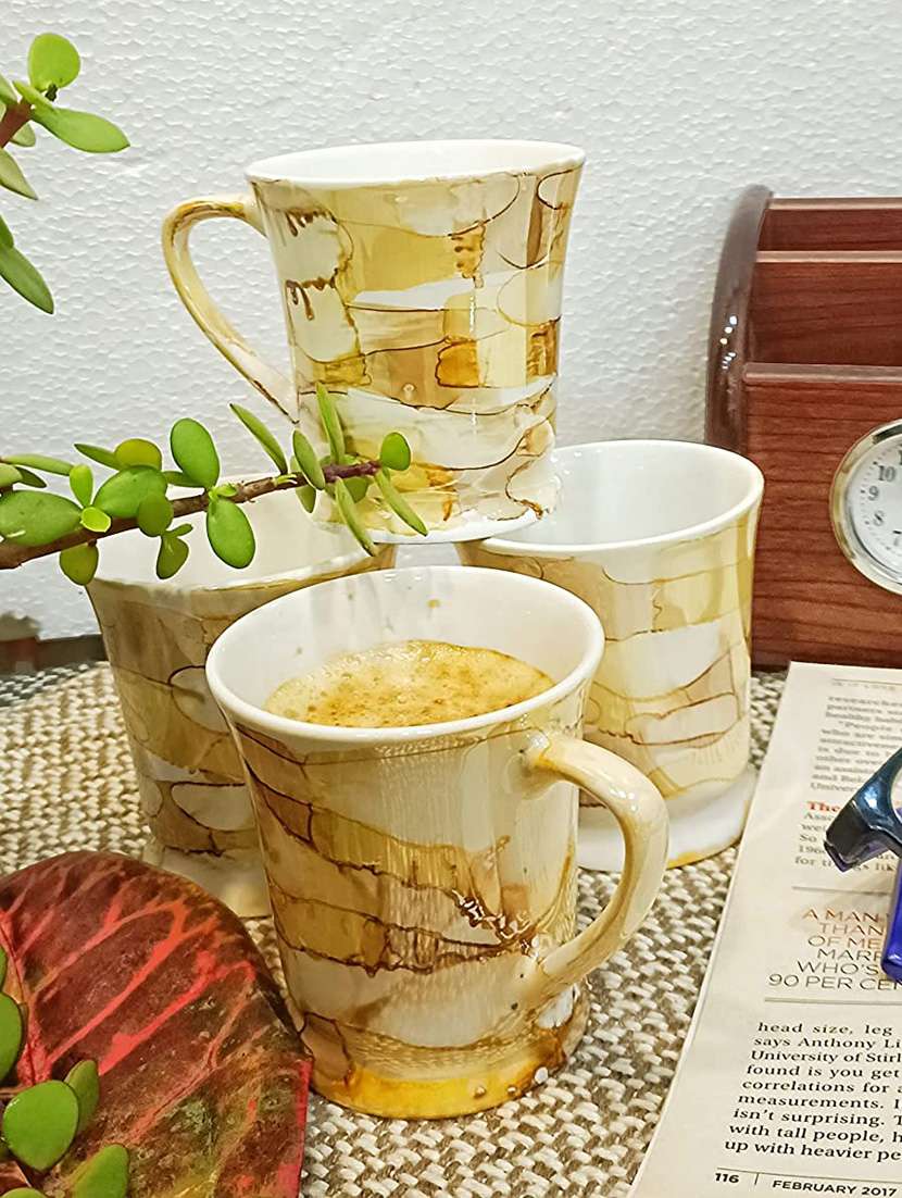 caffeine ceramic handmade yellow & gold tea cup set (set of 4) - 19408756 -  Standard Image - 3