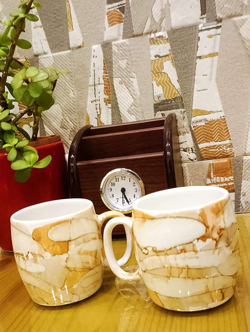 caffeine ceramic handmade yellow tea cup set (set of 4) - 19408789 -  Standard Image - 3