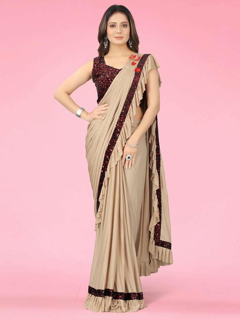 women's bordered beige colored saree with blouse