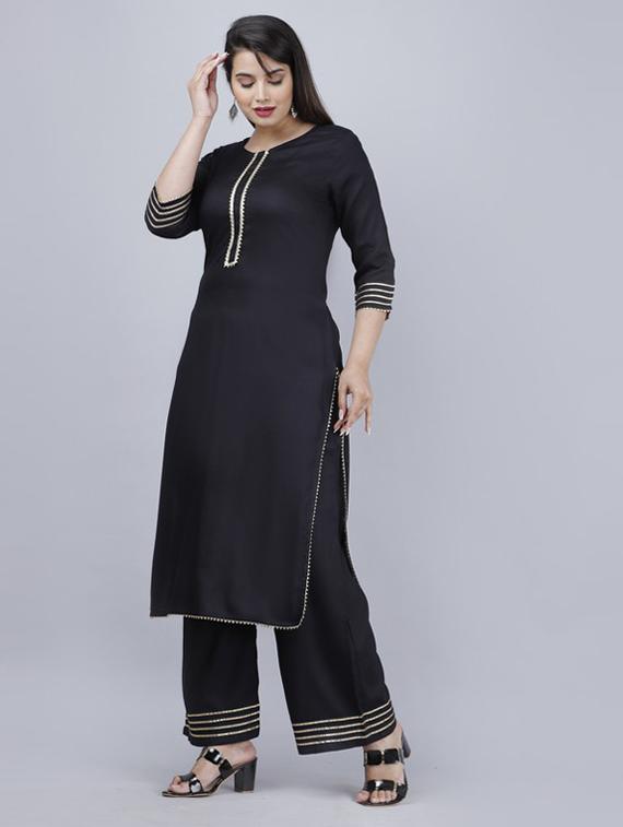 women black solid round neck kurta palazzo set - 19481712 - Zoom Image - 0