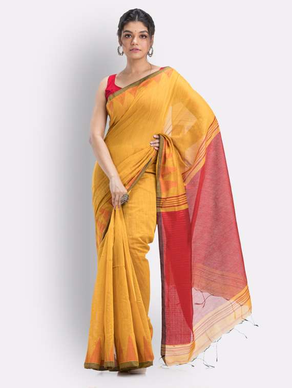 women's self design mustard colored saree with blouse