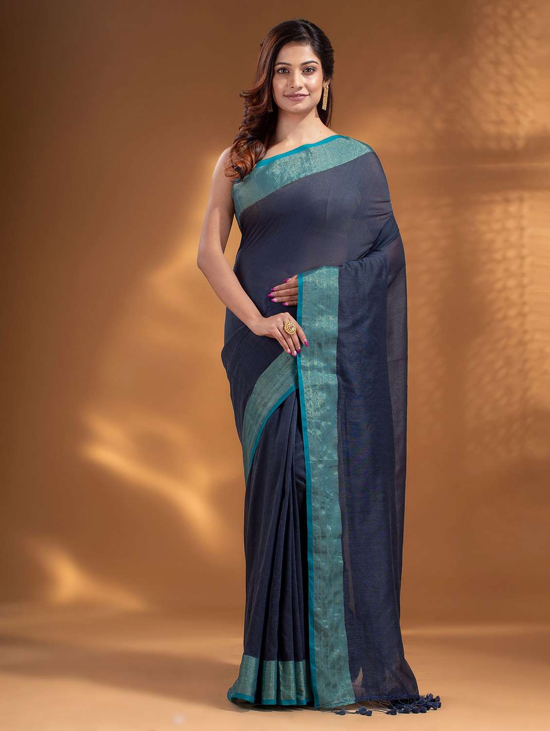 blue self design woven saree with blouse