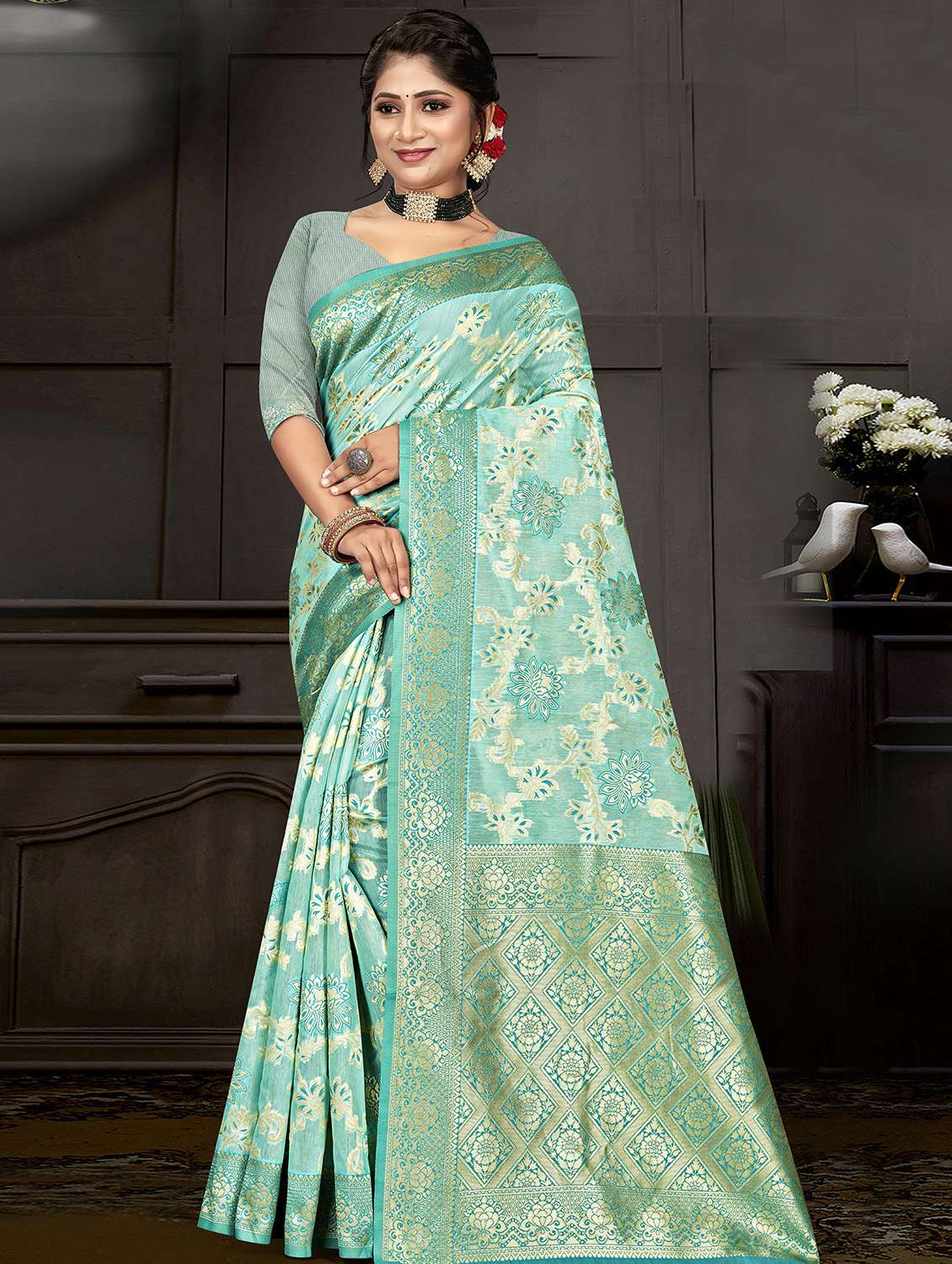 women's self design turquoise colored saree with blouse