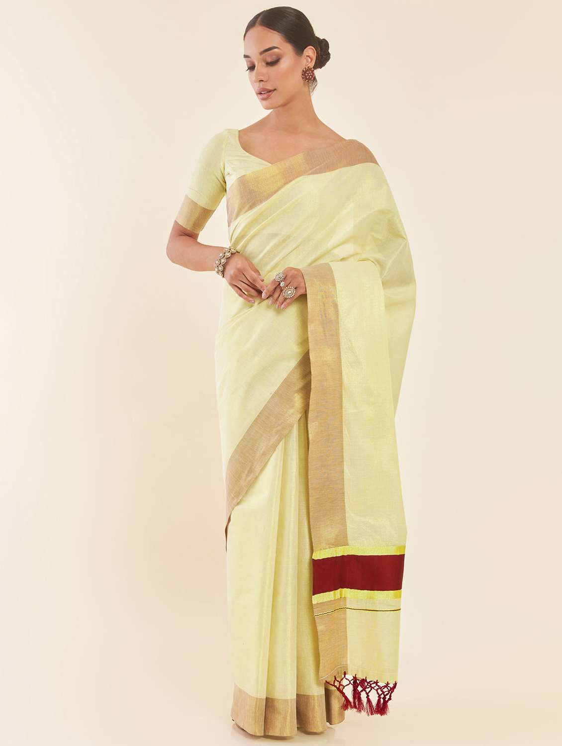 women's self design gold colored saree