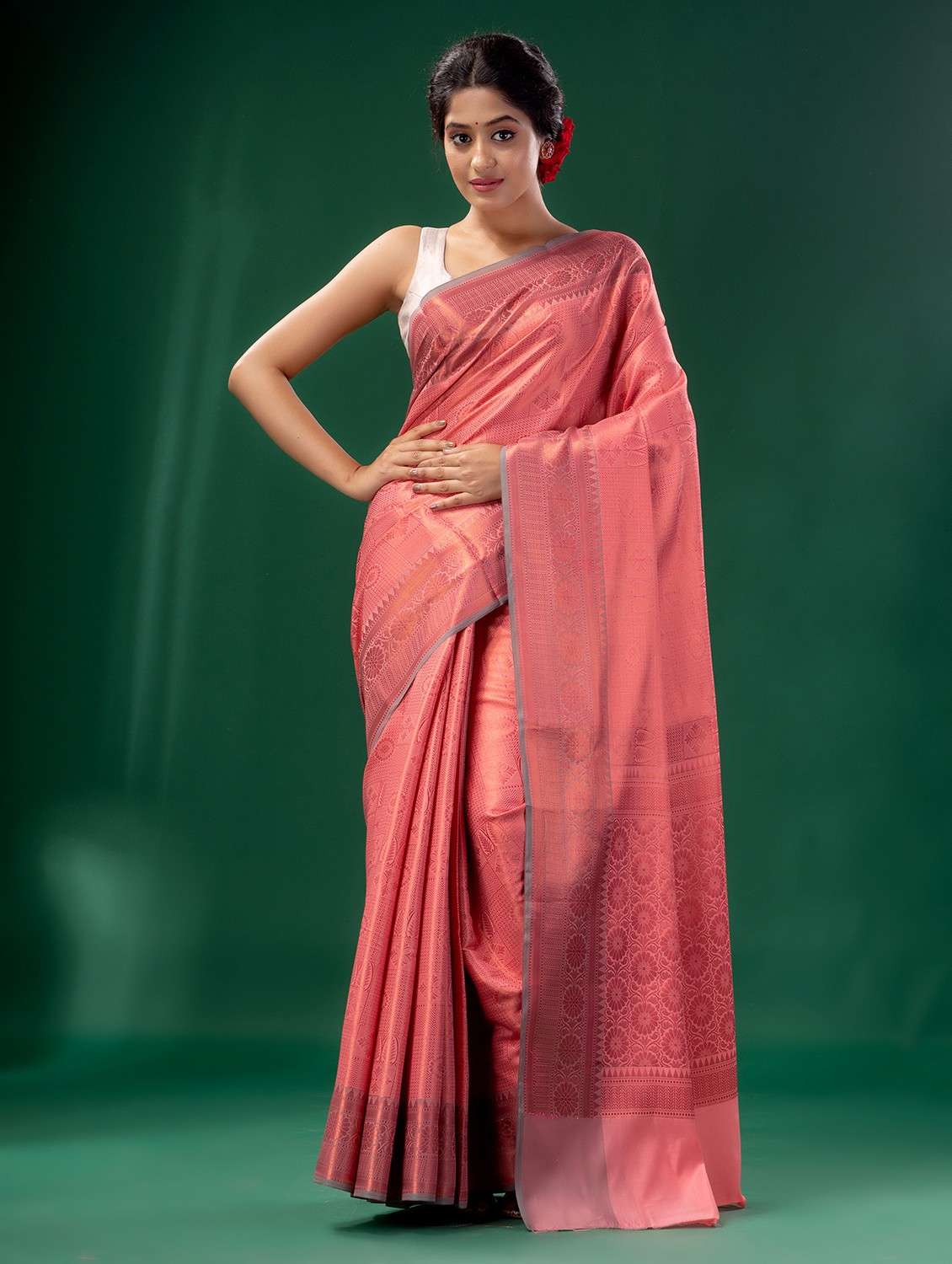 women's self design coral colored saree with blouse