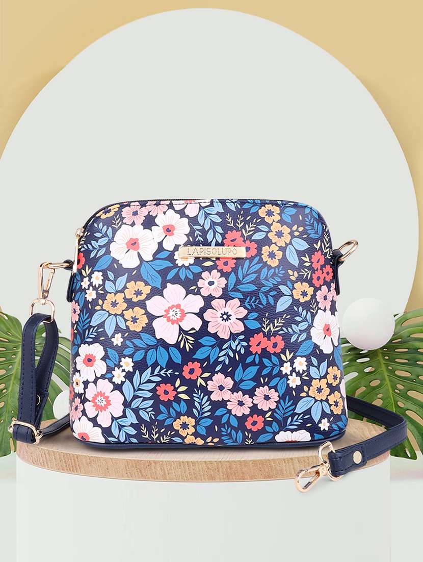 printed leatherette sling bag