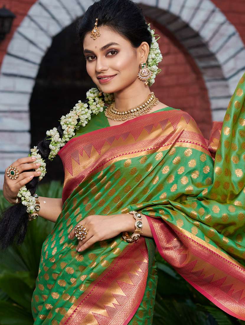 Women's Self Design Green Colored Saree With Blouse