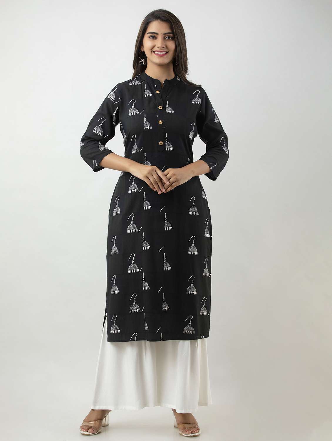 black printed three quarter sleeve kurta sharara set