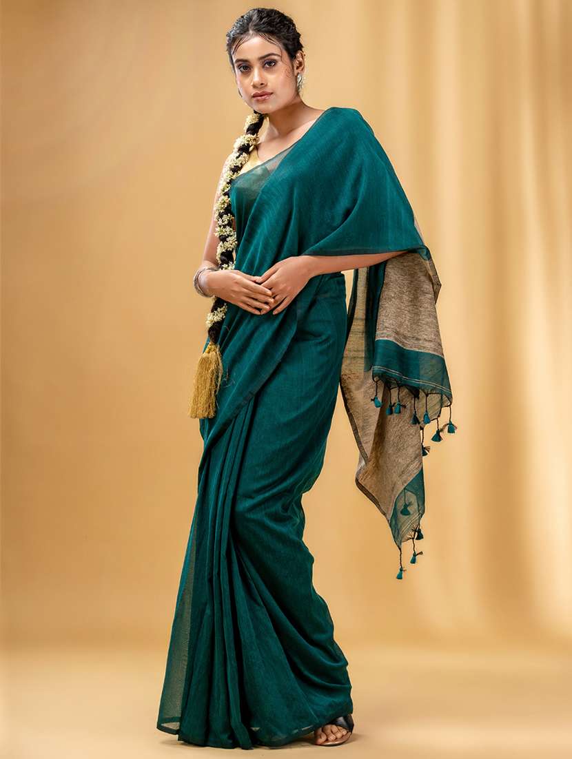 women's self design teal colored saree with blouse