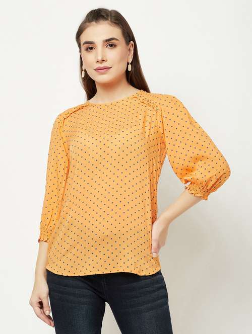 orange polka dots straight top - 20294987 -  Standard Image - 0