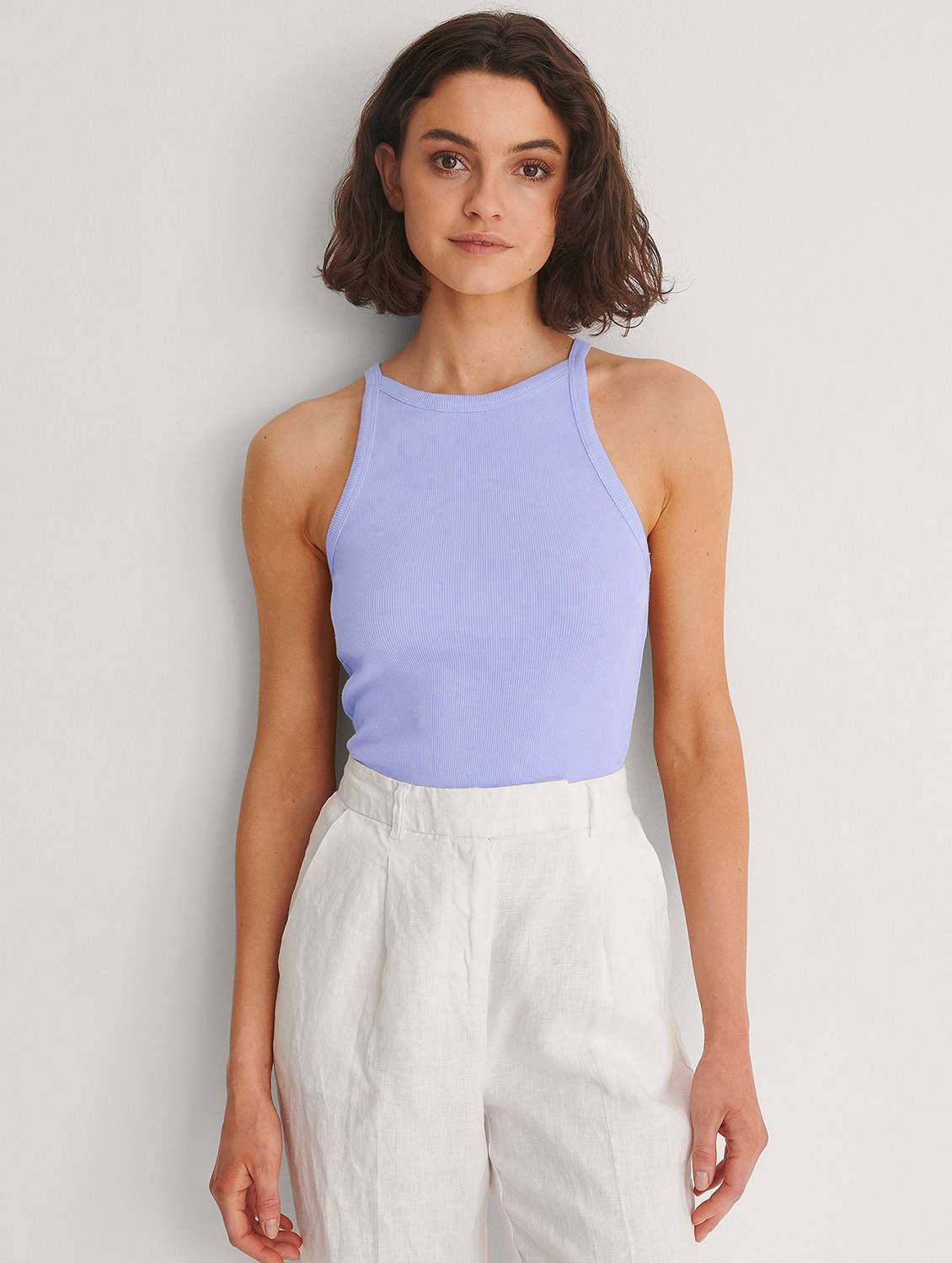 light blue solid sleeveless tank top - 20299358 - Zoom Image - 0