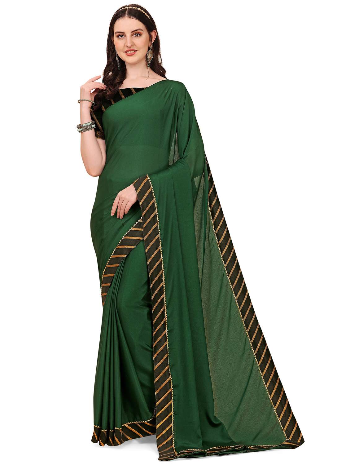women's bordered green colored saree with blouse