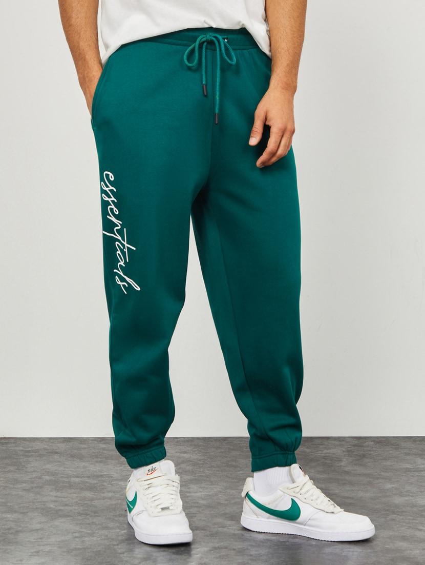 men mid rise placement printed jogger track pant - 20488820 - Zoom Image - 0
