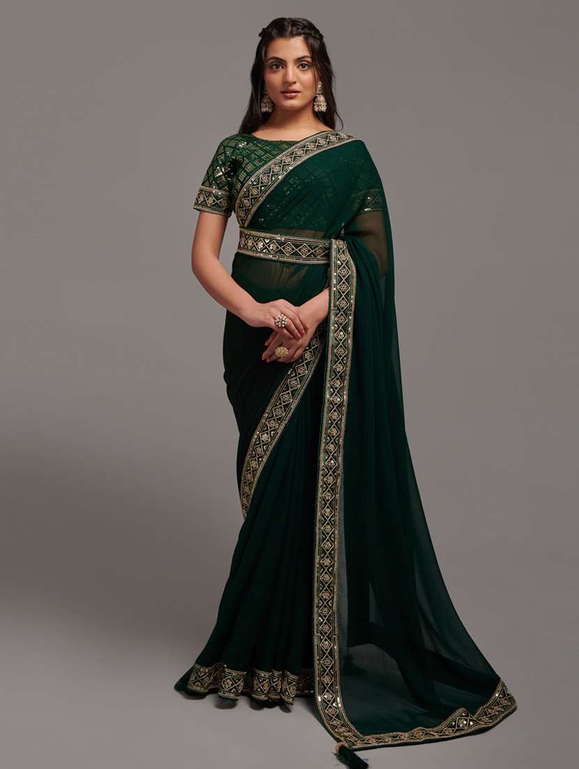 women's bordered green colored saree with blouse