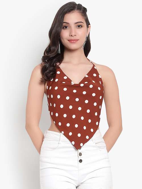 women polka doted backless top