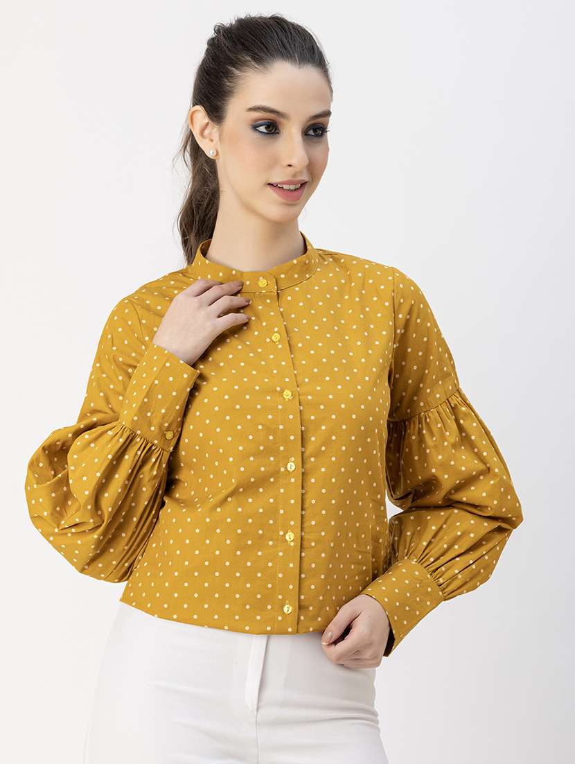 women polka doted bishop sleeves shirt