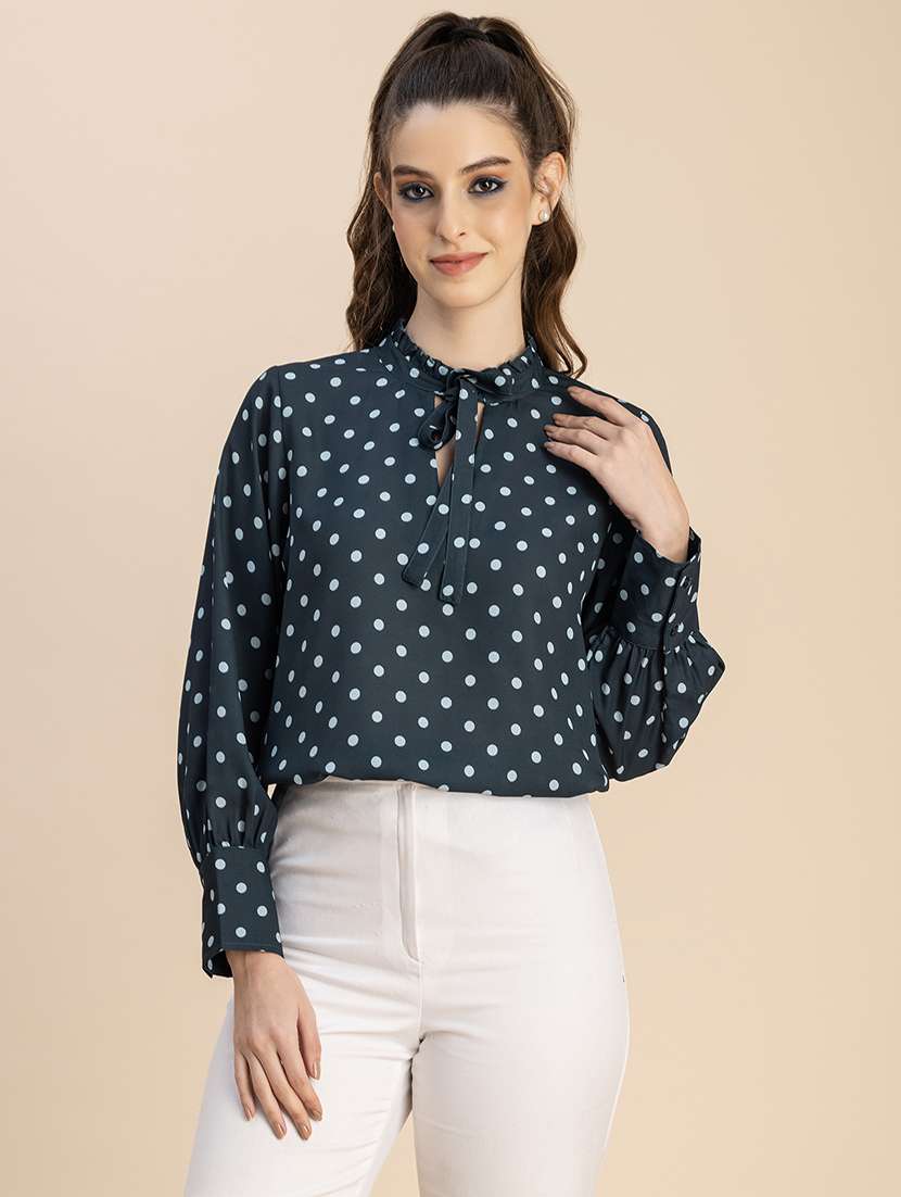 women polka doted puff sleeves top