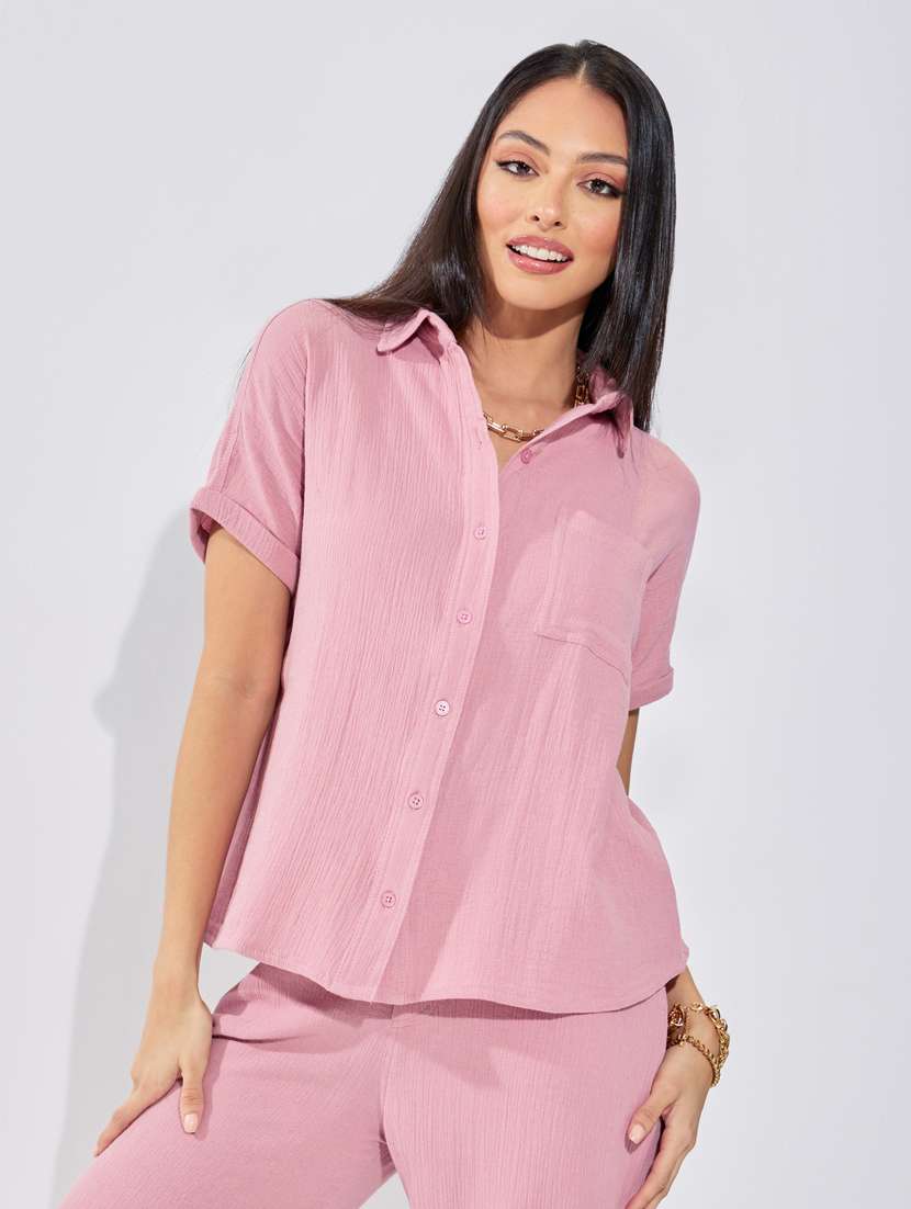 women pink solid regular shirt