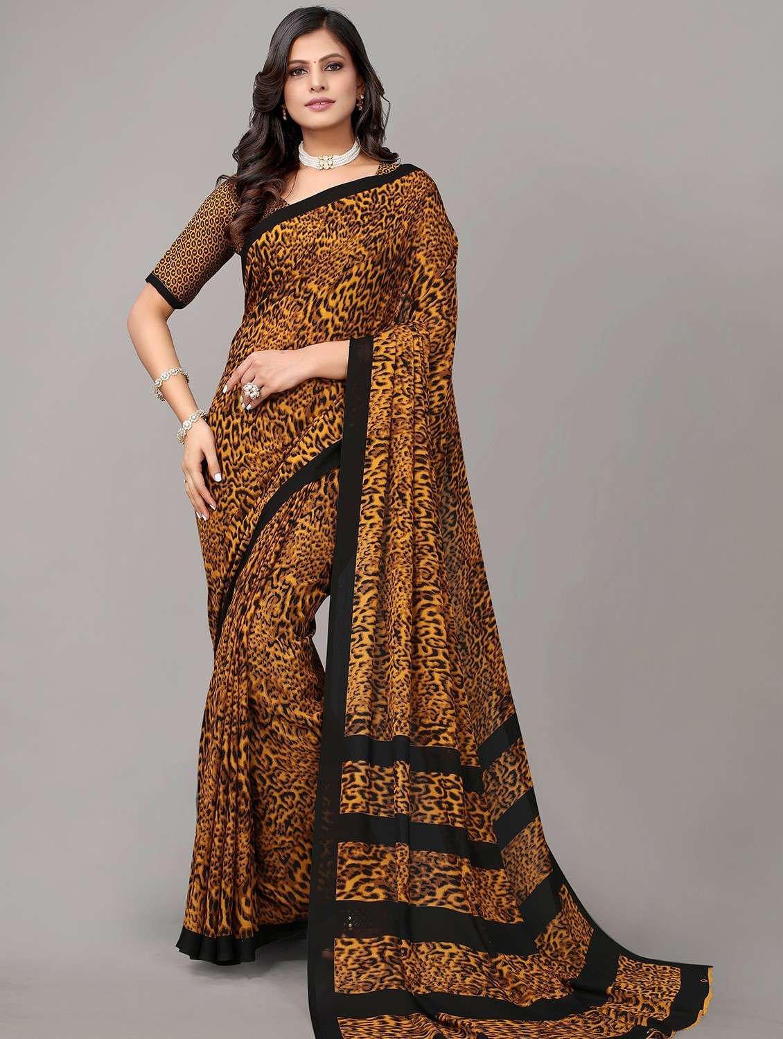 women black animal print georgette saree with blouse - 20873050 - Zoom Image - 0