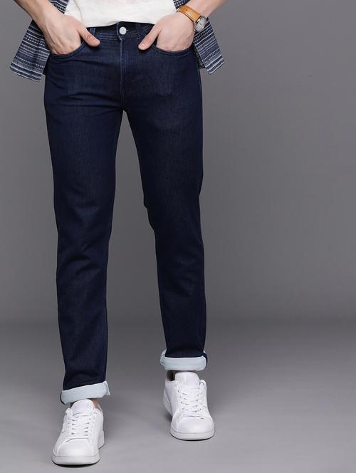 men solid mid rise cotton jeans - 20983244 - Standard Image - 0