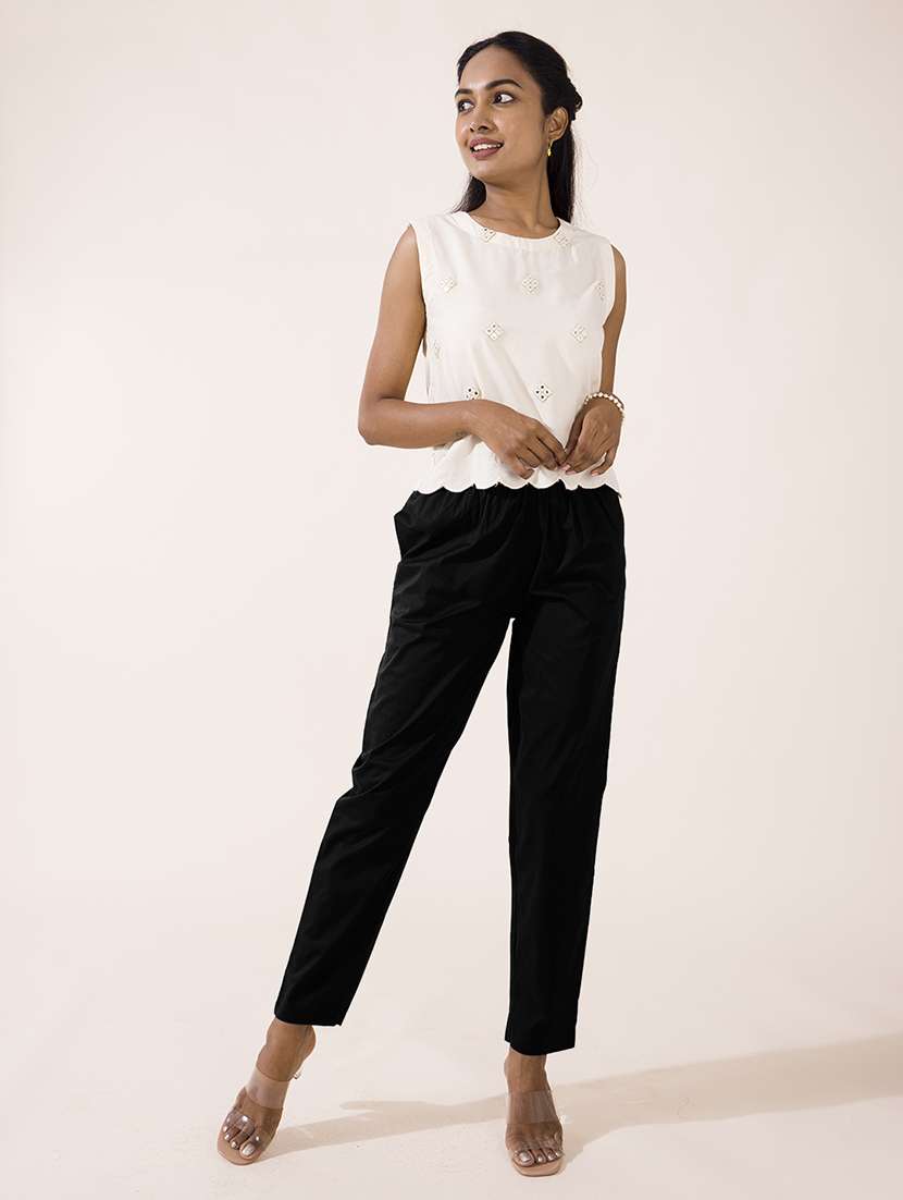 women solid mid rise ankle length tapered pant