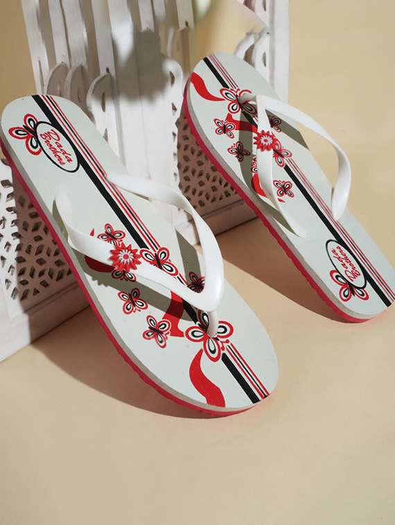white rubber slippers flip flops