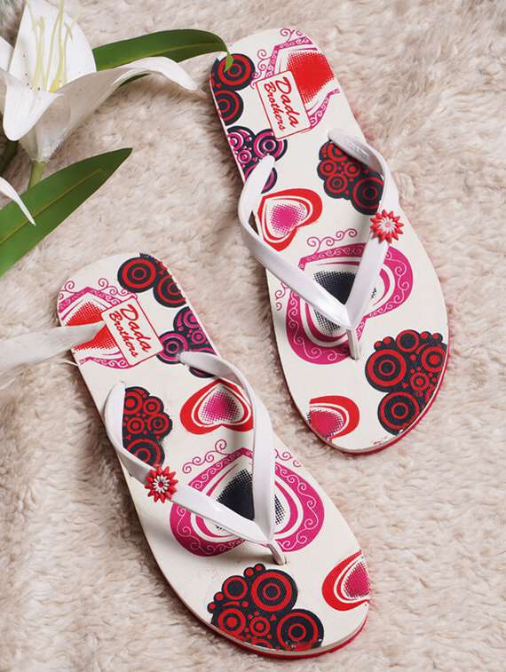 white rubber slippers flip flops