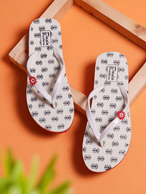 white rubber slippers flip flops