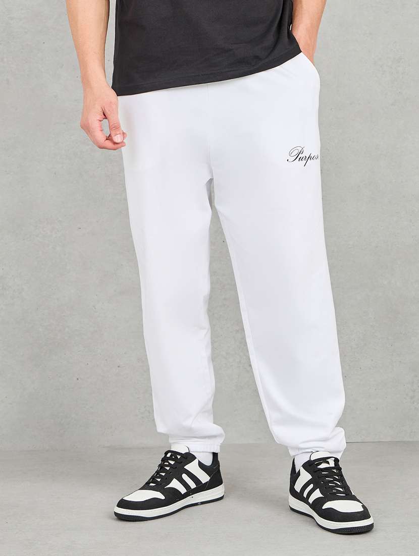 men white solid mid rise jogger