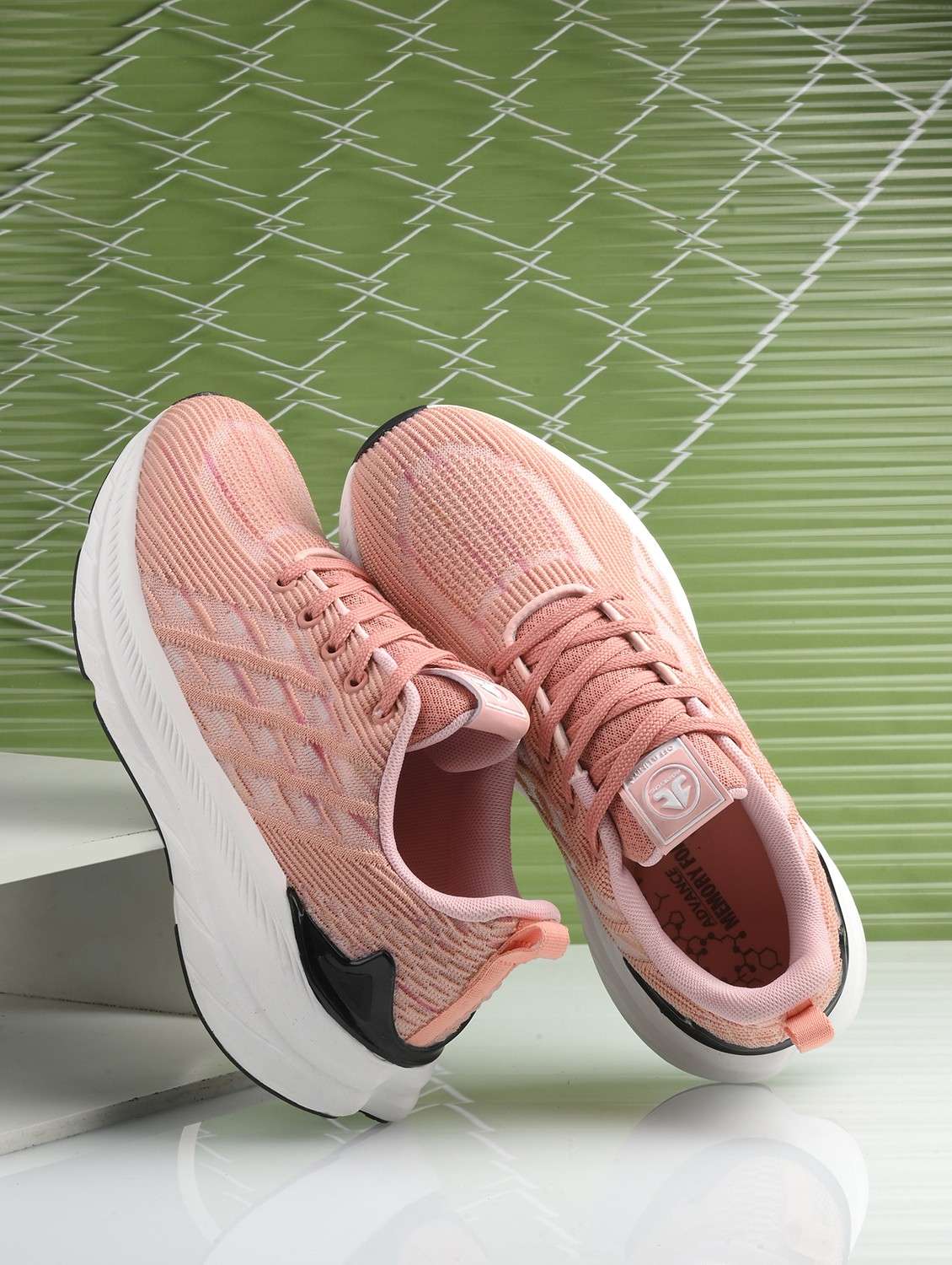 peach flyknit laceup sports shoes