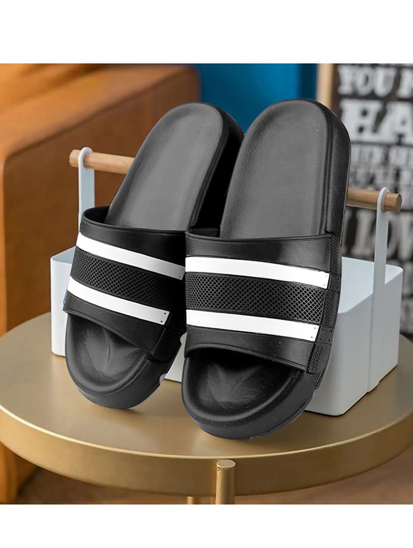 black synthetic slip on flip flops