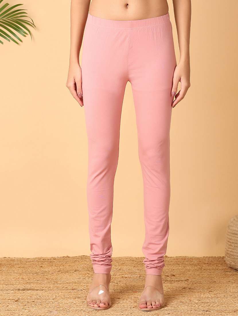 women peach solid leggings
