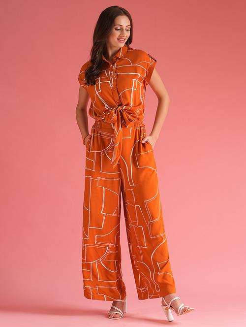 globus women brown abstract print extended sleeves shirt style waist tie-up jumpsuit - 21225181 - Standard Image - 0