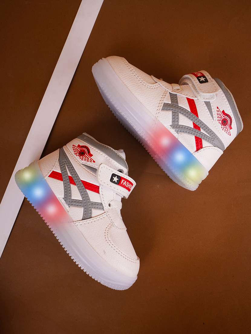 white synthetic sneaker