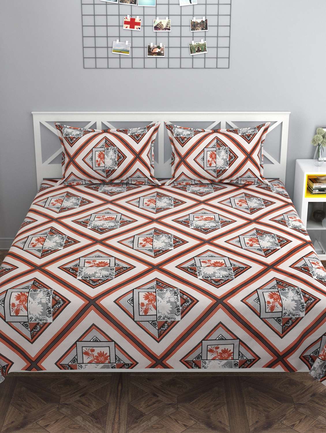 white printed double bedsheet with two pillow covers 