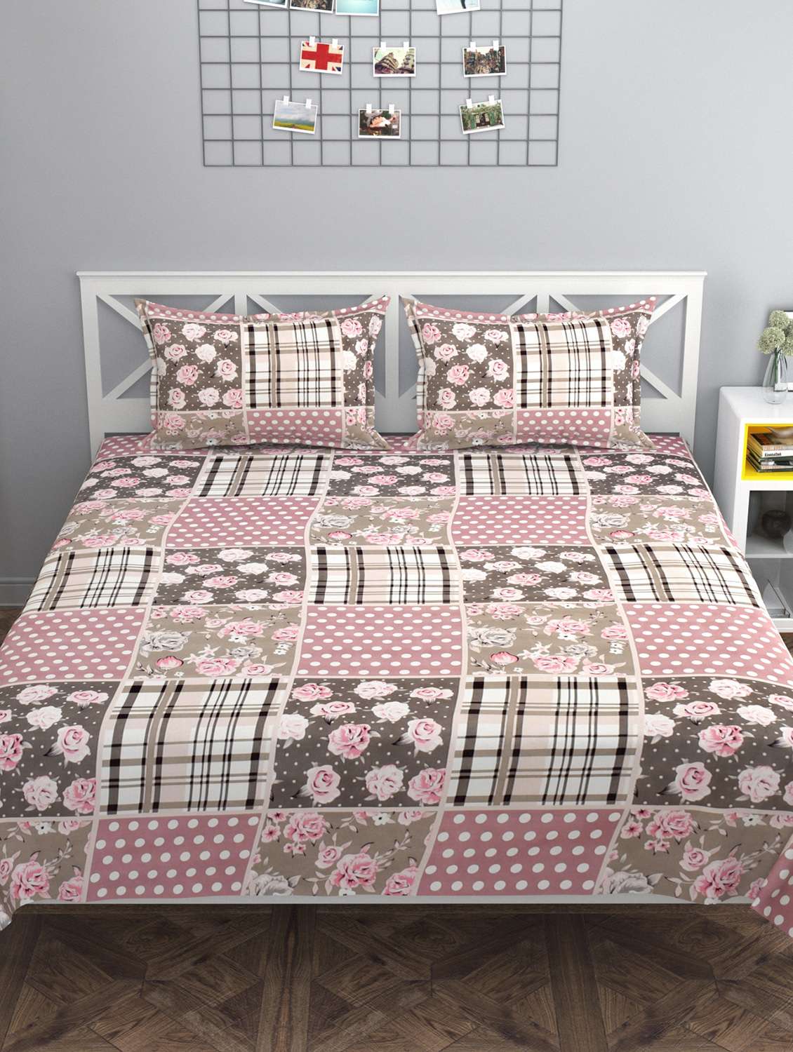 pink printed double bedsheet with two pillow covers 