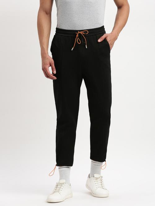 men black solid mid rise jogger - 21276810 - Standard Image - 0