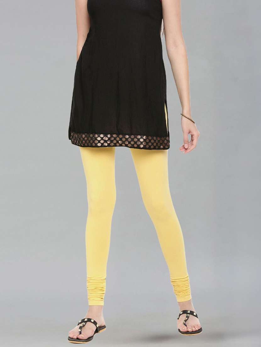 women solid mid rise churidar legging