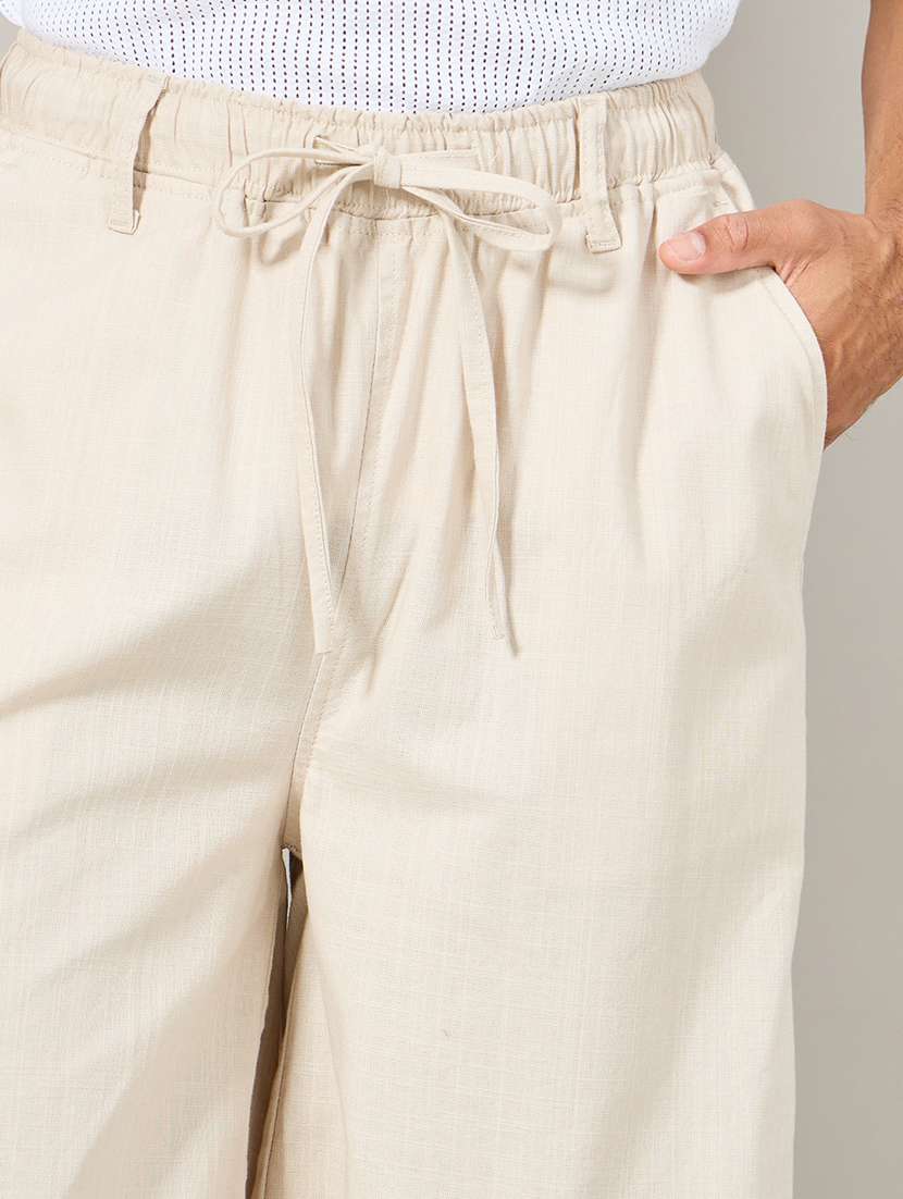 men cream solid joggers - 21307630 -  Standard Image - 3