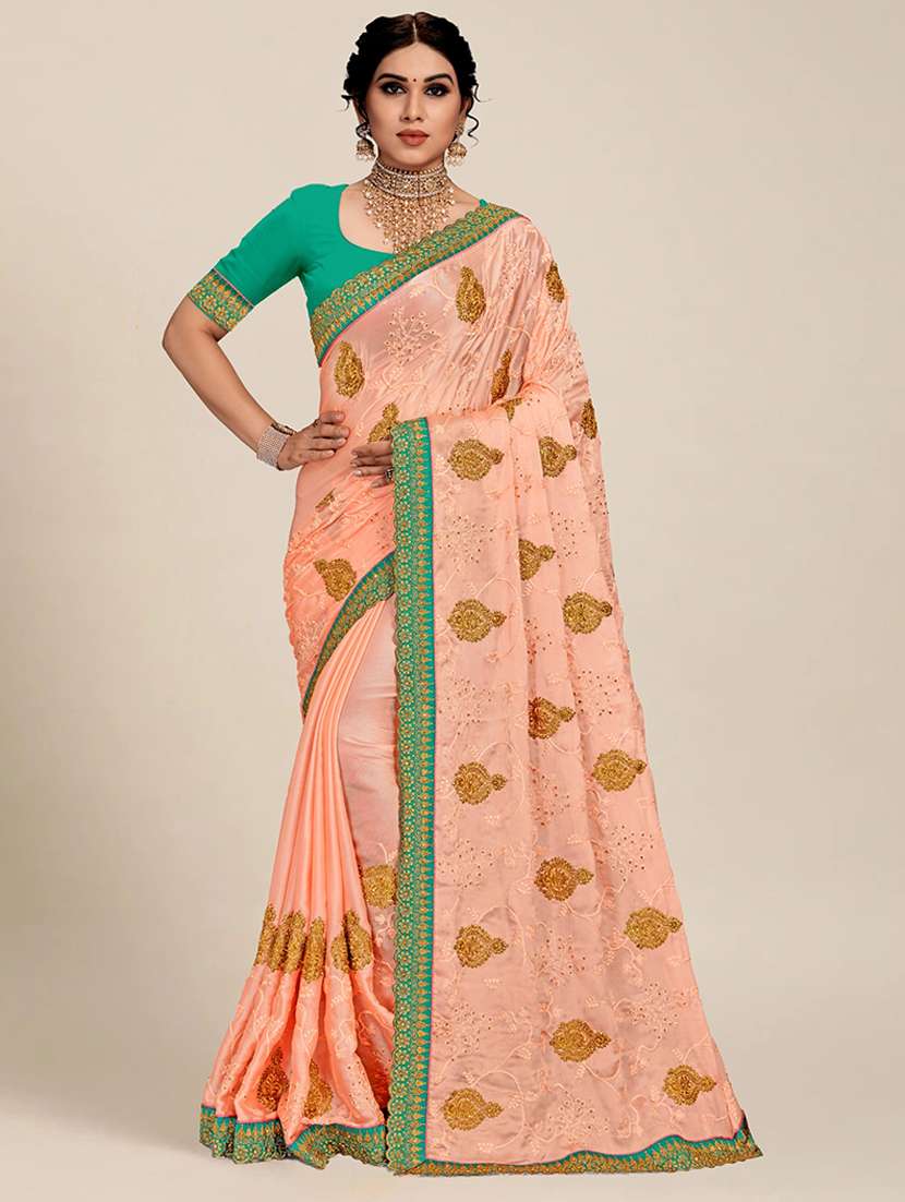 women peach embroidered saree with blouse