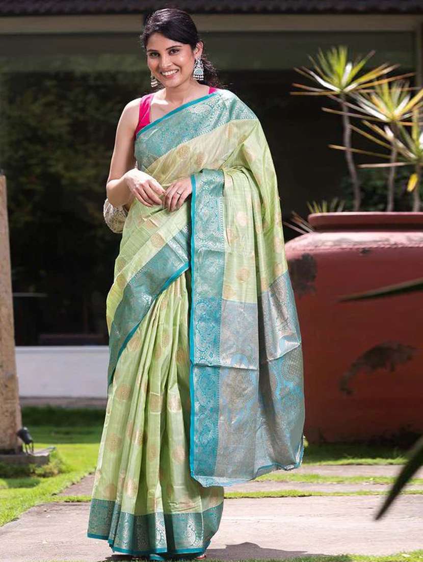 women green banarasi saree with blouse