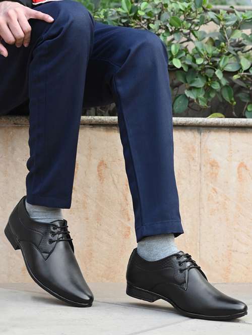 black synthetic laceup derbies