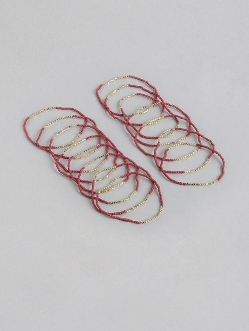 red metal beaded bracelet - 21341475 -  Standard Image - 0