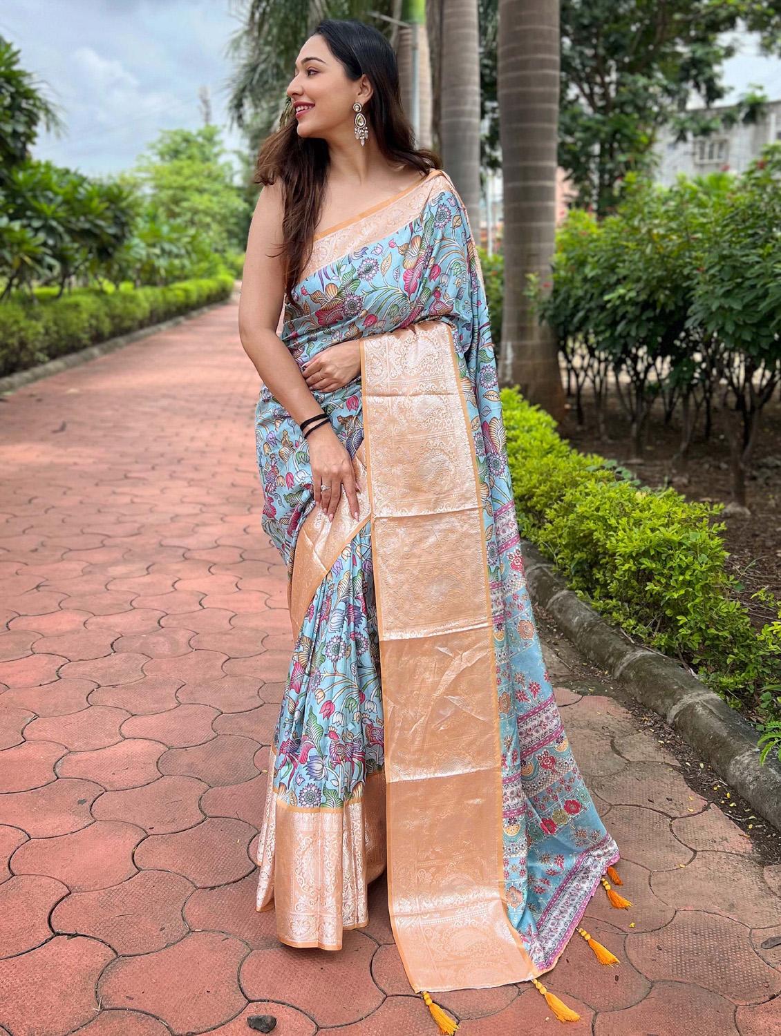  women light blue floral printed bordered saree with blouse