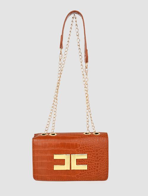 brown textured handbag - 21457081 -  Standard Image - 0