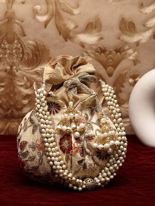 women beige embroidered potli