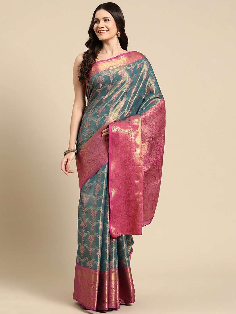 women teal green banarasi saree