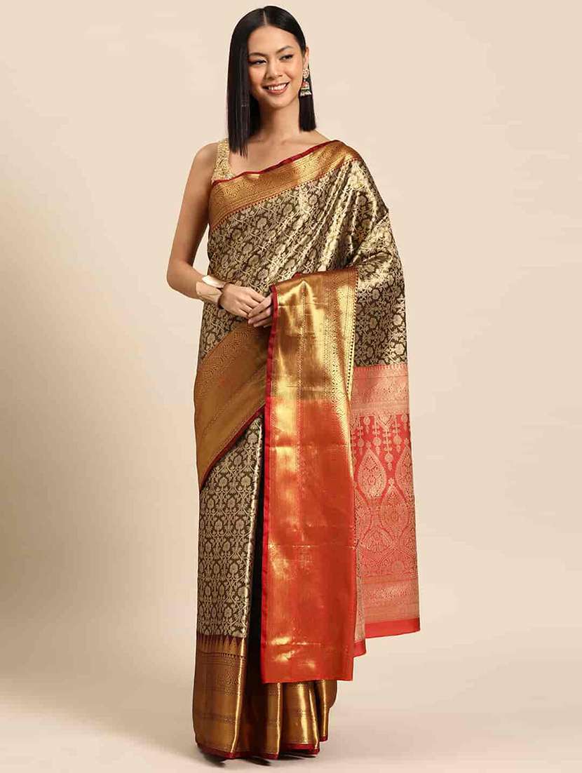 women brown banarasi saree
