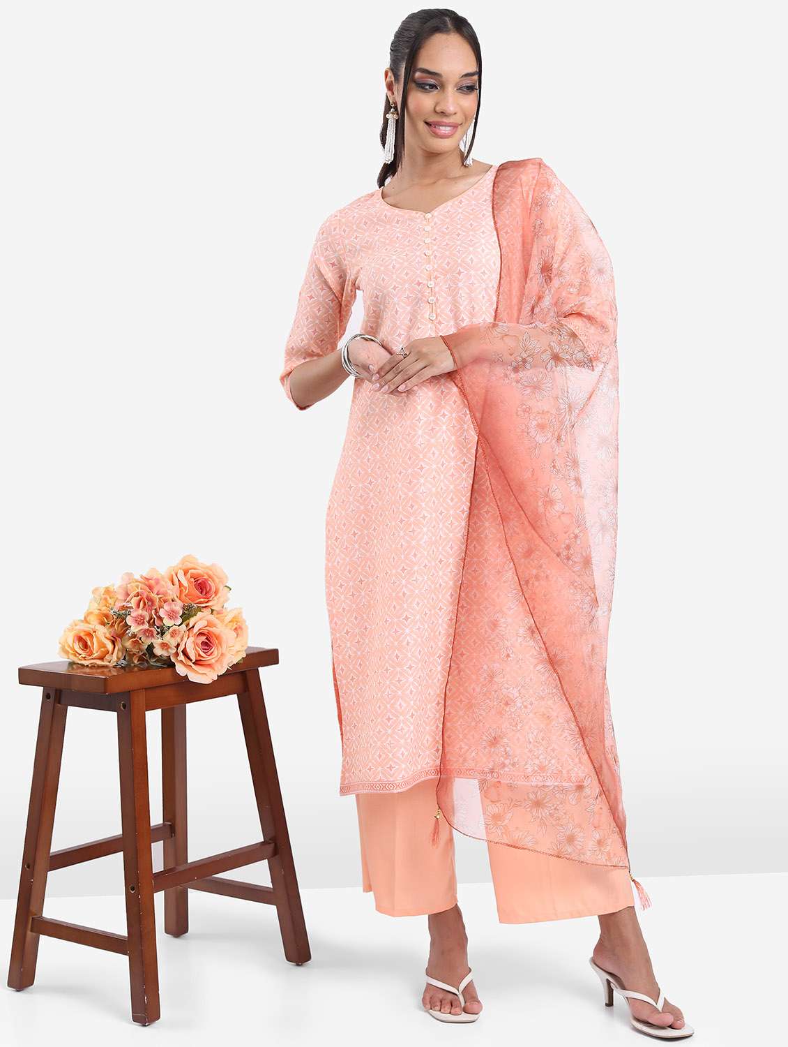 women peach printed kurta palazzo set with dupatta