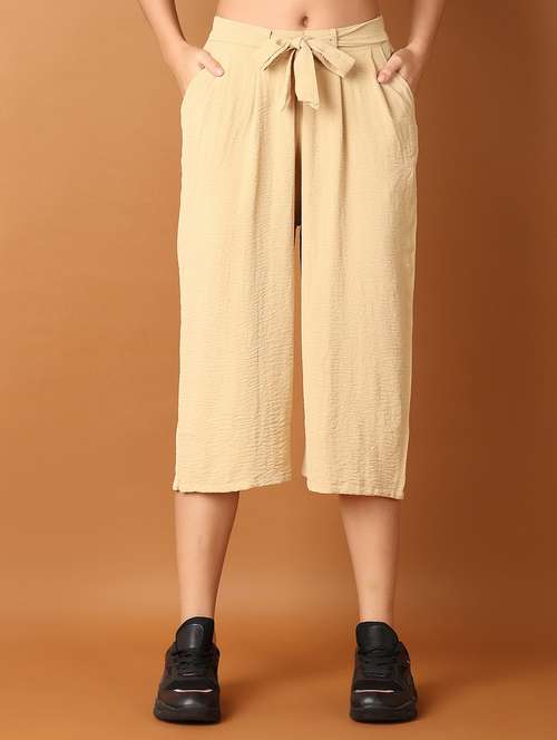 women beige solid capri